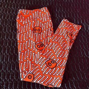 LuLaRoe TC Orange Skull and Bones Leggings